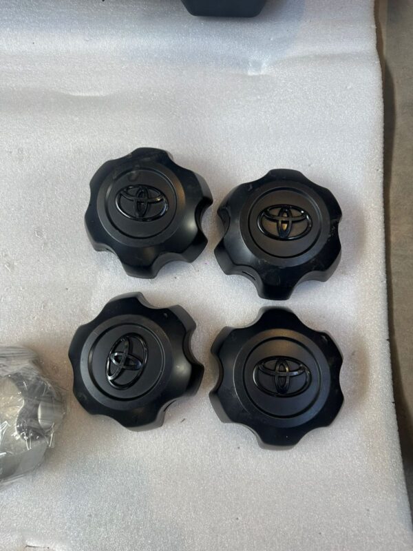 TAZAS CENTRO LLANTAS TOYOTA HILUX ORIGINAL NEGRAS LAS 4